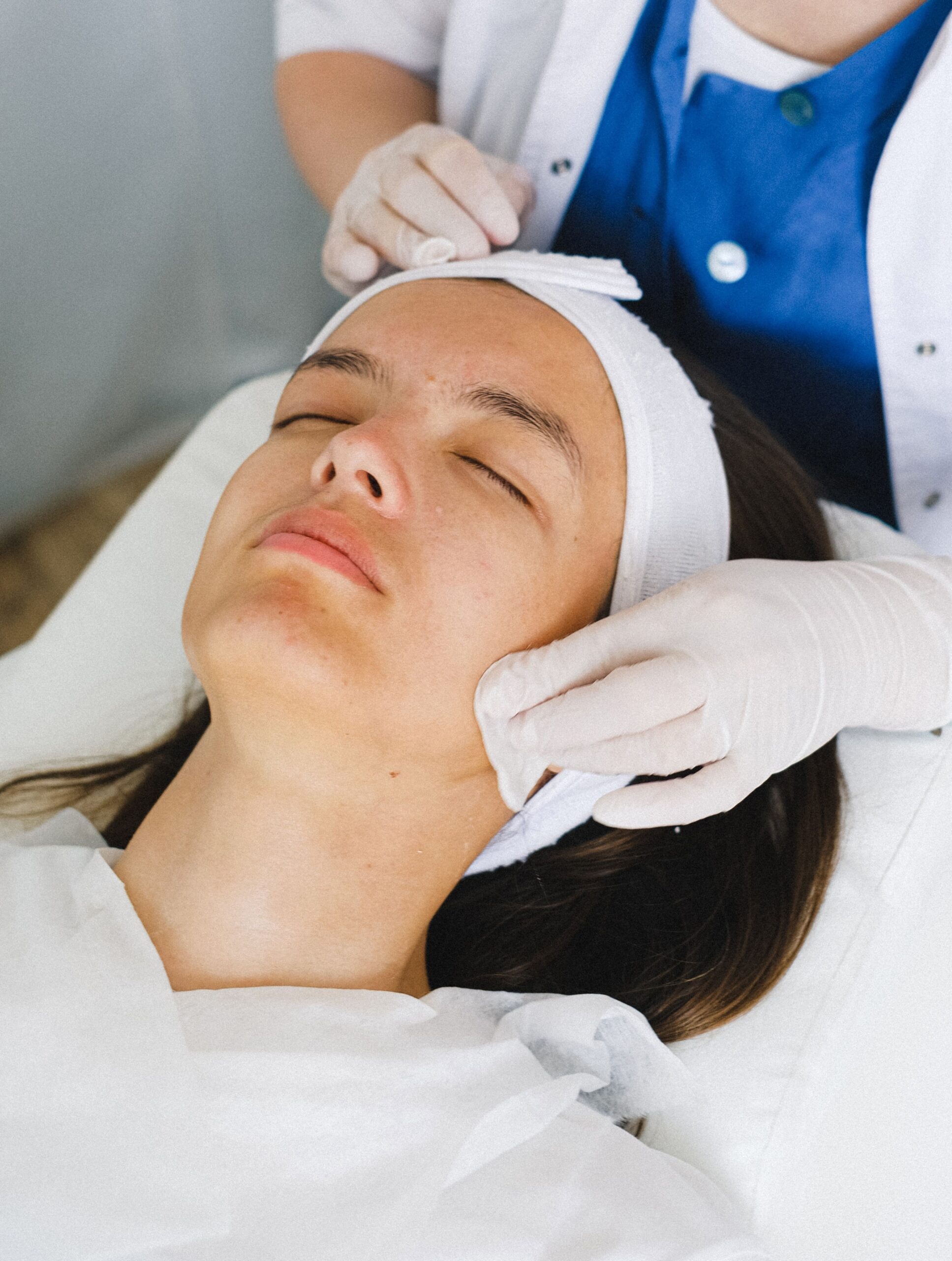 Getting a client ready for her head spa treatment
